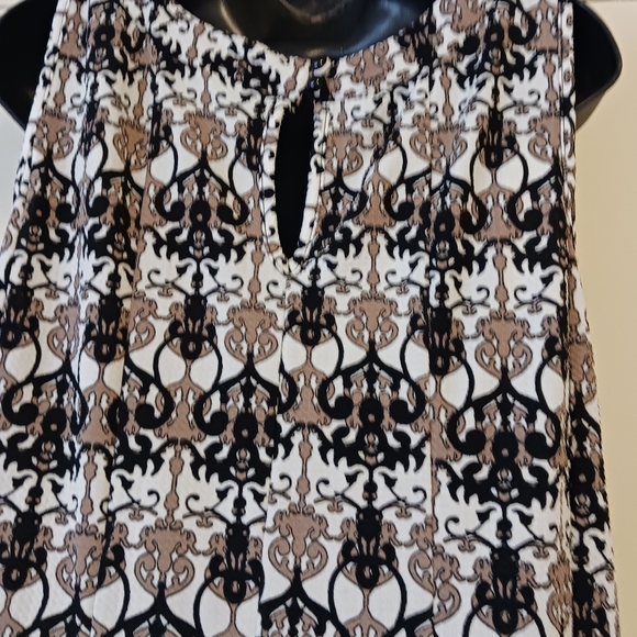 HAANI WOMAN DRESS 2Xcolors white, black , brown, pattern designs. - Picture 4 of 9